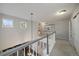 Hallway with natural light and views overlooking the living room at 5107 Pasadena Way, Broomfield, CO 80023
