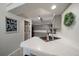 Stylish kitchen featuring white countertops, ample cabinet space, and modern lighting at 5107 Pasadena Way, Broomfield, CO 80023