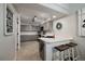Stylish kitchen with ample cabinet space, white countertops, and modern appliances at 5107 Pasadena Way, Broomfield, CO 80023
