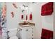Bright bathroom showcases a modern vanity, colorful decor, and contemporary fixtures at 48 Galapago St, Denver, CO 80223