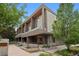 Modern townhome exterior with covered entryway and contemporary architectural details at 48 Galapago St, Denver, CO 80223