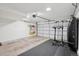 Clean garage with exercise equipment and storage rack at 48 Galapago St, Denver, CO 80223