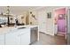 Stylish kitchen featuring quartz countertops, stainless steel appliances, and an adjacent dining area perfect for gatherings at 48 Galapago St, Denver, CO 80223