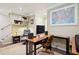 Home office featuring hardwood floors, wall art, computer, and rolling desk chair at 48 Galapago St, Denver, CO 80223