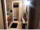 Well-lit bathroom with a dual-sink vanity, and tiled floor at 6711 S Ivy Way # B5, Centennial, CO 80112