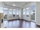 Spacious living room with hardwood floors, recessed lighting, and a cozy fireplace at 5455 Landmark Pl # 407, Greenwood Village, CO 80111