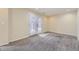 Finished basement with french doors leading to a patio at 822 Shadowstone Dr, Highlands Ranch, CO 80129