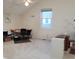 Spacious bedroom with neutral carpet and ample natural light through a large window at 7290 S Cook Cir, Centennial, CO 80122