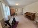 Bonus room complete with natural light, neutral paint, and carpeted floors at 7290 S Cook Cir, Centennial, CO 80122