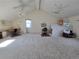 Bonus room offering great natural light, neutral paint, carpet, and high ceiling at 7290 S Cook Cir, Centennial, CO 80122