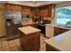 The eat-in kitchen boasts stainless steel appliances and bright countertops at 7290 S Cook Cir, Centennial, CO 80122