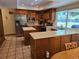 Eat in kitchen features stainless steel appliances and lots of cabinet storage at 7290 S Cook Cir, Centennial, CO 80122