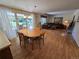 Spacious living room open to dining area offers seamless flow and access to backyard at 7290 S Cook Cir, Centennial, CO 80122
