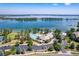 Aerial shot showcasing lakefront amenities, pool and clubhouse, and boat access, offering luxurious lakeside living at 5350 S Marshall St, Littleton, CO 80123