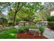 Serene backyard patio with comfortable seating, beautiful landscaping, and tranquil ambiance, perfect for relaxation at 5350 S Marshall St, Littleton, CO 80123