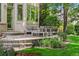 Inviting backyard patio featuring stylish outdoor seating with stone steps, ideal for entertaining in a private setting at 5350 S Marshall St, Littleton, CO 80123