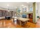 Open dining space with hardwood floors and bay windows offering plenty of natural light at 5350 S Marshall St, Littleton, CO 80123