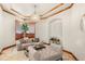 Inviting sitting room showcasing refined décor and an elegant chandelier at 5350 S Marshall St, Littleton, CO 80123