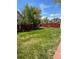 The backyard has a red fence at 5988 W Crestline Ave, Littleton, CO 80123