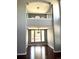 Dining room with hardwood floors beneath an overlook at 5988 W Crestline Ave, Littleton, CO 80123