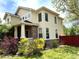 Charming two-story home with stone accents and landscaping at 5988 W Crestline Ave, Littleton, CO 80123
