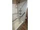A well lit walk in shower offers accessibility and comfort in this bathroom at 7795 Raritan St, Denver, CO 80221