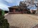 Charming single-story home featuring a rock yard and mature trees in a quiet neighborhood at 7795 Raritan St, Denver, CO 80221