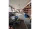Bright and airy workshop space with brick accent wall and ample natural light at 7795 Raritan St, Denver, CO 80221