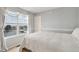 Bright bedroom featuring a large window with bright natural light at 24285 E Wagon Trail Ave, Aurora, CO 80016