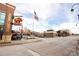 Street view of Southlands Town Center outdoor shopping mall in Aurora, Colorado with restaurant and retail space at 24285 E Wagon Trail Ave, Aurora, CO 80016