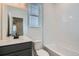 Bathroom with a white subway tiled shower at 9645 Browns Peak Cir, Littleton, CO 80125