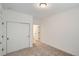 Bright bedroom with closet and entry to the bathroom at 9645 Browns Peak Cir, Littleton, CO 80125