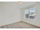 Well-lit bedroom with a view out the window at 9645 Browns Peak Cir, Littleton, CO 80125