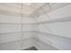Walk-in pantry with adjustable metal shelving offering plenty of storage space at 9645 Browns Peak Cir, Littleton, CO 80125