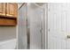 Bathroom featuring a modern shower stall and built-in storage, maximizing space and functionality at 1847 S Union Blvd, Lakewood, CO 80228