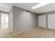 Neutral bedroom with a skylight and plush carpeting features two closets and a contemporary design at 1847 S Union Blvd, Lakewood, CO 80228