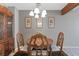Dining area with wood furniture, a china cabinet, and decor at 1847 S Union Blvd, Lakewood, CO 80228