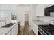 Stylish kitchen with stainless steel appliances, granite counters and walk in pantry at 8809 Sedalia St, Commerce City, CO 80022