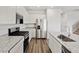 Well-equipped kitchen featuring stainless steel appliances, granite countertops, and ample cabinet space at 8809 Sedalia St, Commerce City, CO 80022