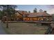 Luxury home on spacious lot with a large deck and surrounding trees at 28940 Pinewood Vista Dr, Evergreen, CO 80439