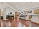 Basement with wet bar, a game area, and a sitting area at 28940 Pinewood Vista Dr, Evergreen, CO 80439