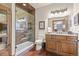 Basement bathroom with a large walk-in shower and modern vanity at 28940 Pinewood Vista Dr, Evergreen, CO 80439