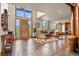 Grand entryway with high ceilings, stone flooring, and access to the living areas at 28940 Pinewood Vista Dr, Evergreen, CO 80439