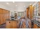 Modern kitchen with a spacious island and lots of natural light at 28940 Pinewood Vista Dr, Evergreen, CO 80439