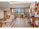 Spacious living room with high ceilings, large windows and comfortable seating at 28940 Pinewood Vista Dr, Evergreen, CO 80439