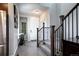 Inviting entryway with staircase, coat closet, and modern decor at 4100 Albion St # 1509, Denver, CO 80216