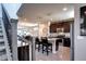 Beautiful kitchen features granite countertops, stainless steel appliances, and a breakfast bar with seating at 4100 Albion St # 1509, Denver, CO 80216