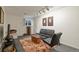 Finished basement with modern furniture, a patterned rug, and a well-lit atmosphere at 1503 W Briarwood Ave, Littleton, CO 80120