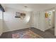 Bright bedroom featuring decorative carpet, closet with shutter doors, and decorated walls at 1503 W Briarwood Ave, Littleton, CO 80120