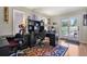 Inviting home office with natural light, organized workspaces and outdoor access at 1503 W Briarwood Ave, Littleton, CO 80120
